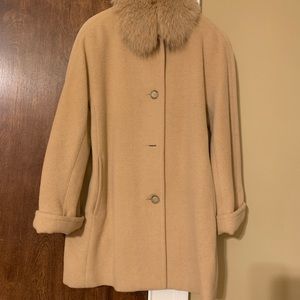 Women’s wool coat with removable fox fur collar.